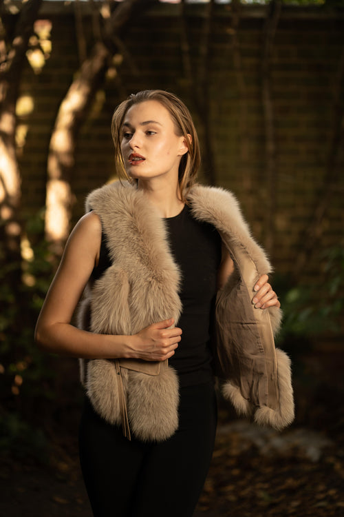 Faux Fur Gilet with Leather Pockets in Light brown