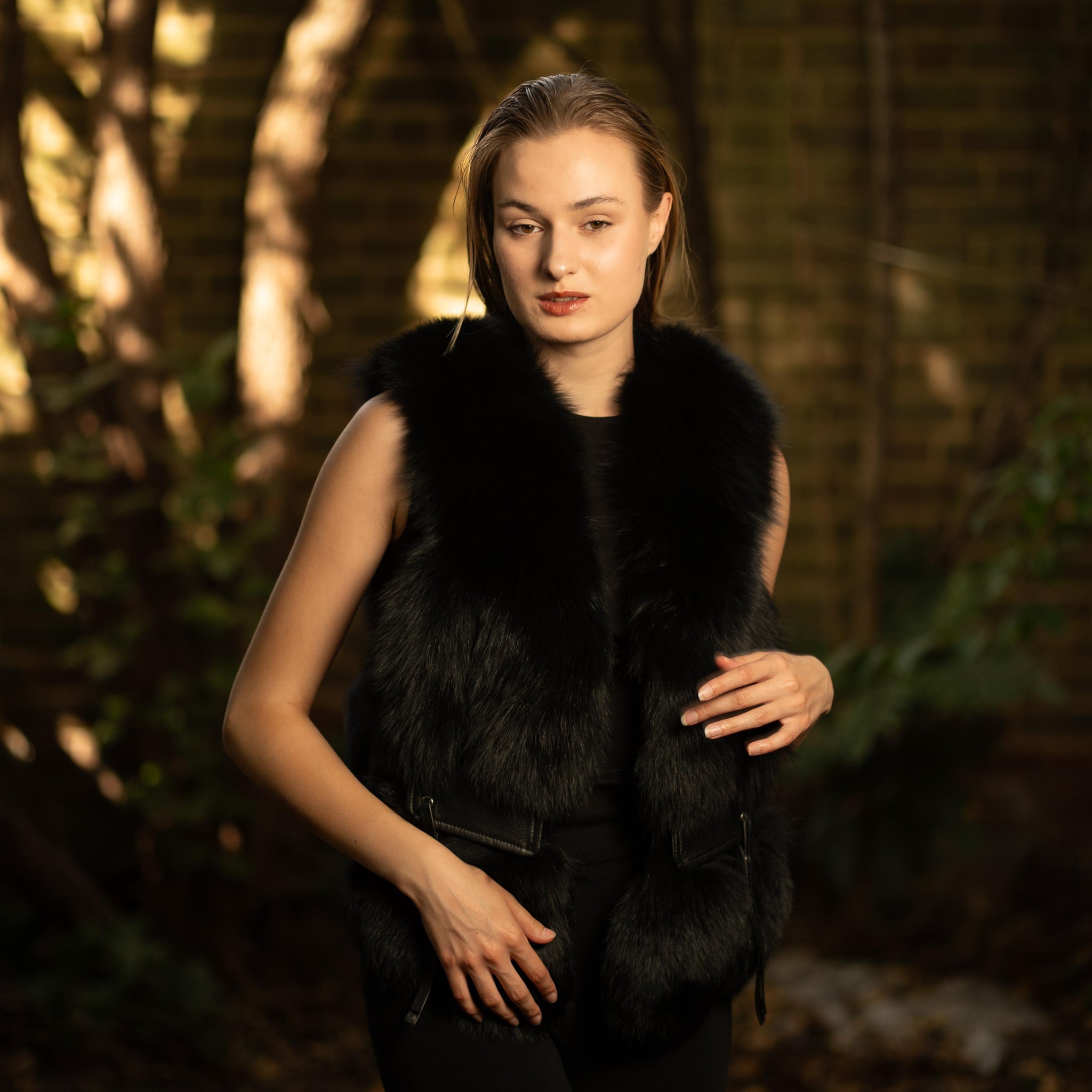 Faux Fur Gilet with Leather Pockets in Black