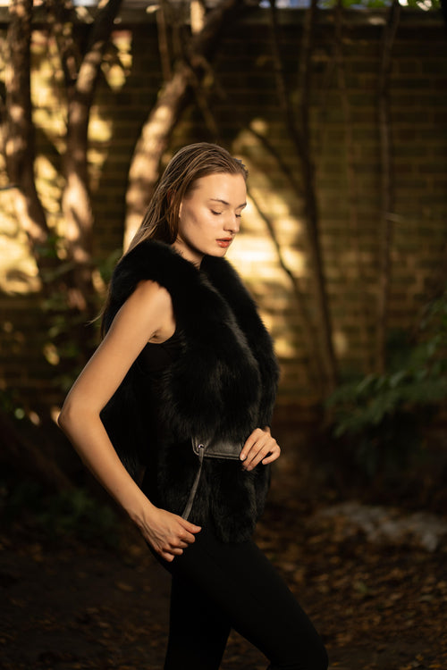 Faux Fur Gilet with Leather Pockets in Black