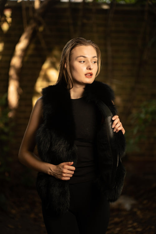 Faux Fur Gilet with Leather Pockets in Black